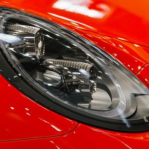 Head Lights Of Red Luxurious Sports Car